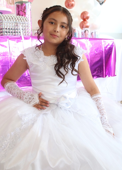 Sandra Sarmiento Suárez, Valeria Barrera Sarmiento, Isabella Barrera Sarmiento y Alejandro Barrera Martínez.