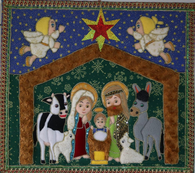 Cuadro de pesebre navideño, una de sus primeras manualidades navideñas.