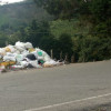 En la Troncal de Occidente se observa un basurero a cielo abierto. 