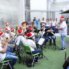 La banda sinfónica estudiantil de la Institución Educativa Nuestra Señora del Rosario tocó villancicos y música colombiana.