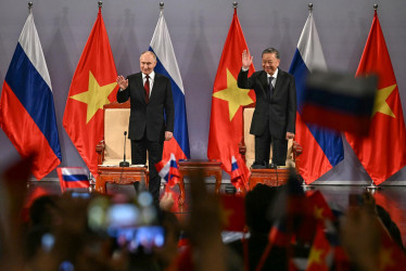 Vladimir Putin y su homólogo de Vietnam, To Lam.