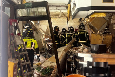 La explosión se presentó en el bar 'Mis Tesoros' de la calle Manuel Maroto de Puente de Vallecas, en Madrid. También afectó al edificio superior de viviendas.
