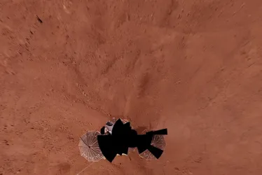 Fotografía cedida por la NASA que muestra la vista alrededor de una nave espacial enviada a Marte. 