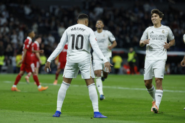 El delantero francés del Real Madrid, Kylian Mbappé, tras conseguir el segundo gol del equipo madridista durante el encuentro de la jornada 17 de LaLiga entre Real Madrid y Sevilla FC