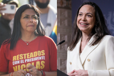 La vicepresidenta ejecutiva de Venezuela, Delcy Rodriguez (i), y a la líder opositora venezolana María Corina Machado. 