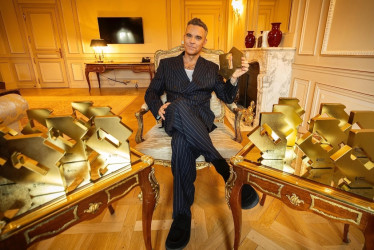 "Britpop - el 16.º álbum #1 que rompe récords", escribió Robbie Williams en su cuenta de X.