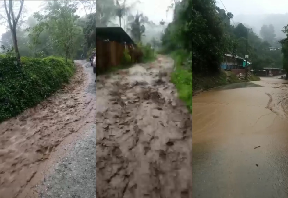 Salida del colegio por la vía convertida en un río, en zona rural de Caldas