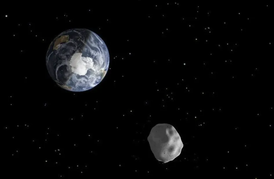 Recreación que representa el paso del asteroide 2012 DA14 a través del sistema Tierra-Luna, en una imagen de archivo. Recreación que representa el paso del asteroide 2012 DA14 a través del sistema Tierra-Luna, en una imagen de archivo.