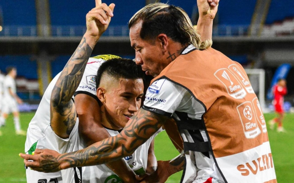 Once Caldas, Atlético Nacional